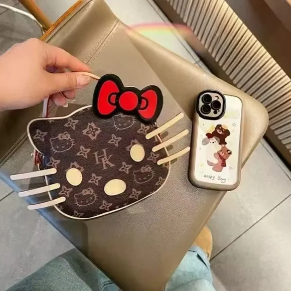 Hello Kitty Brown Monogram Mini Crossbody with Red Bow - Picture 4 of 4